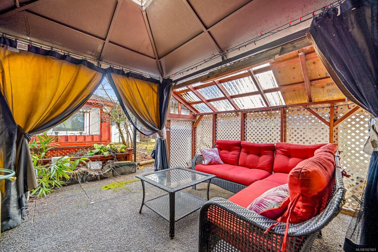 2316B Willemar Ave, Courtenay, BC - Indoor Photo Showing Other Room With Fireplace