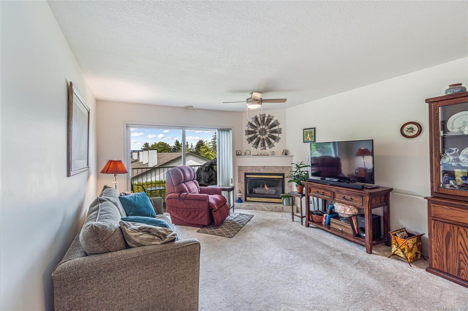203-435 Morison Ave, Parksville, BC - Indoor Photo Showing Living Room With Fireplace