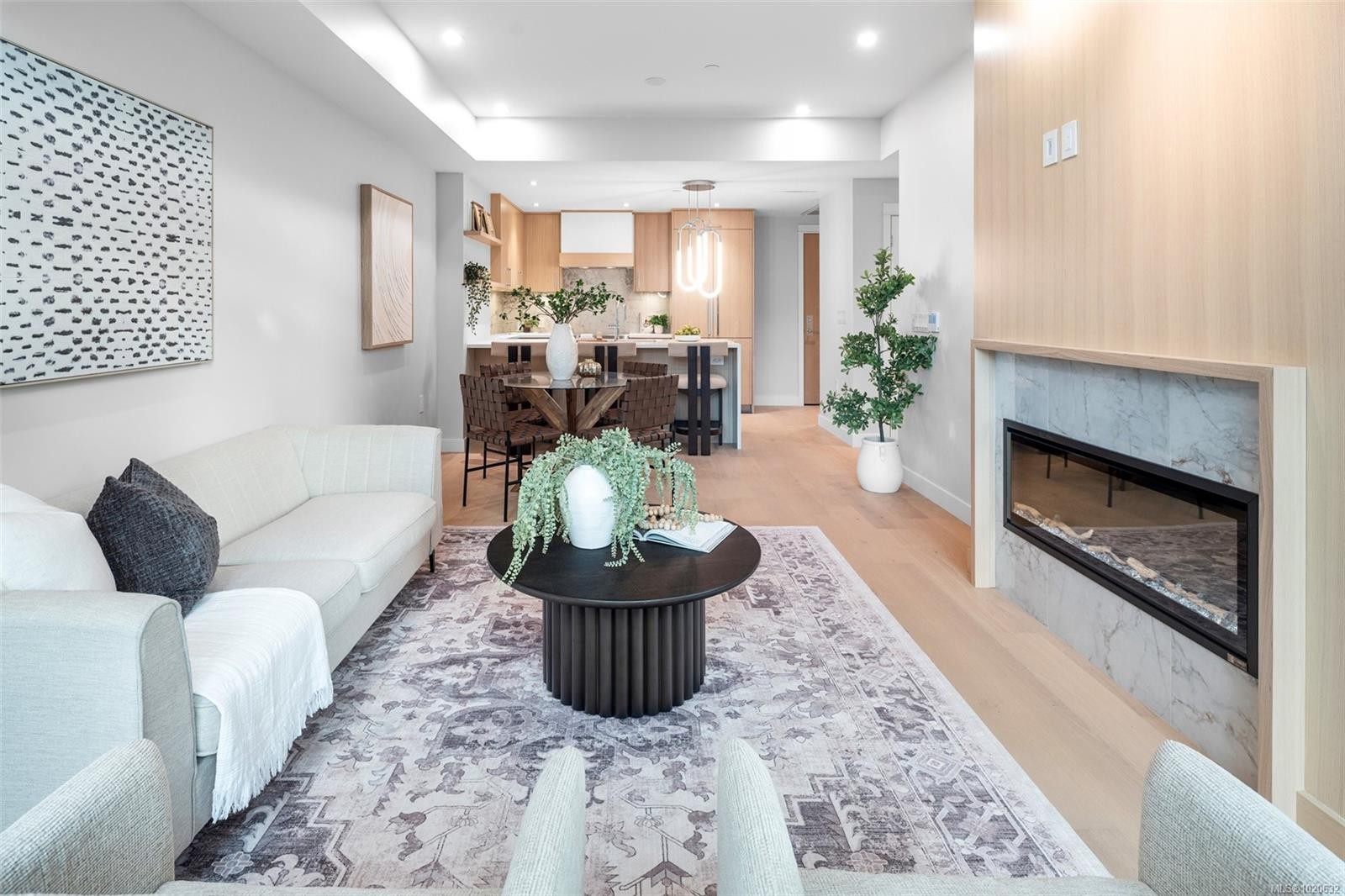 204-5229 Cordova Bay Rd, Saanich, BC - Indoor Photo Showing Living Room With Fireplace