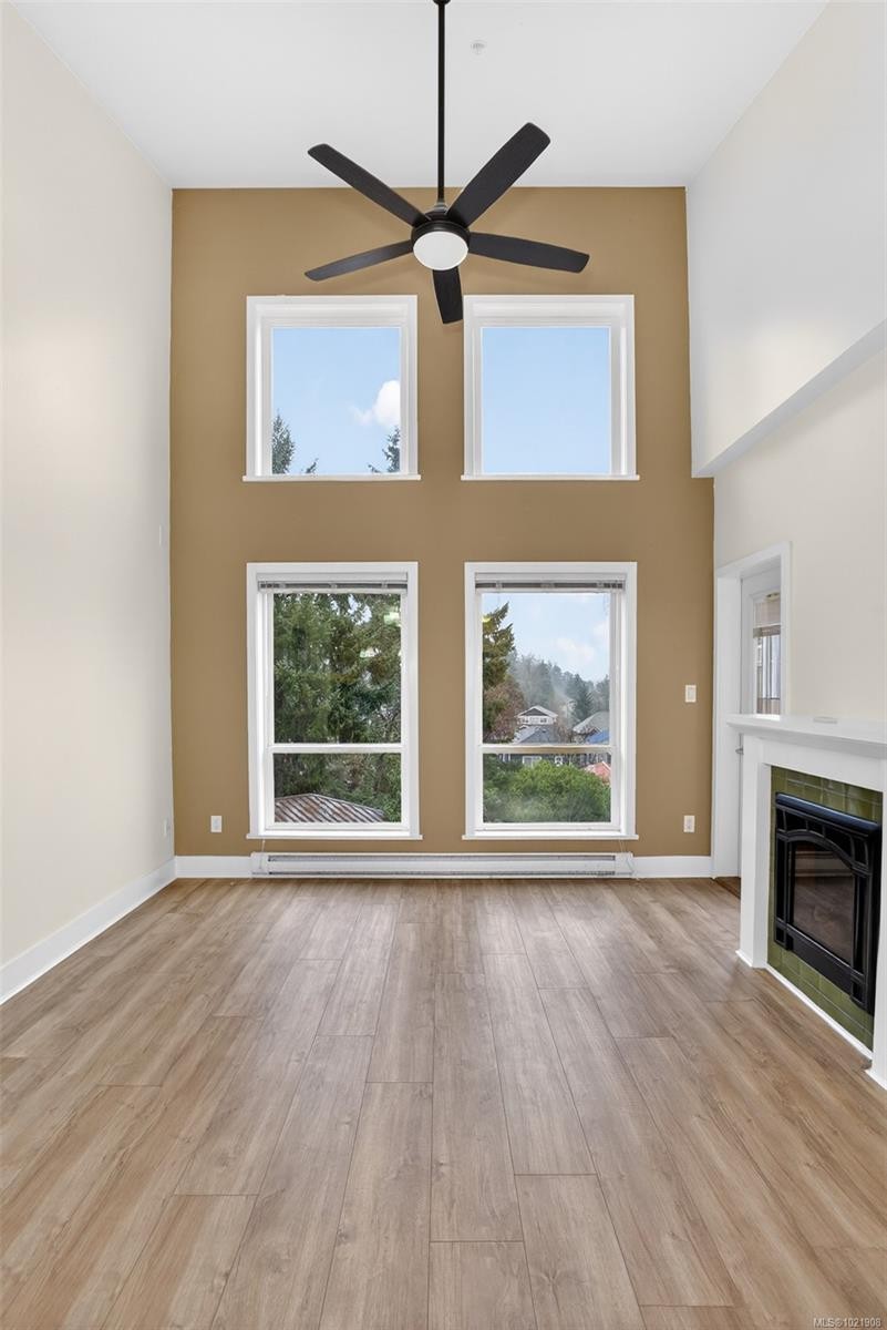 406-866 Brock Ave, Langford, BC - Indoor Photo Showing Living Room With Fireplace