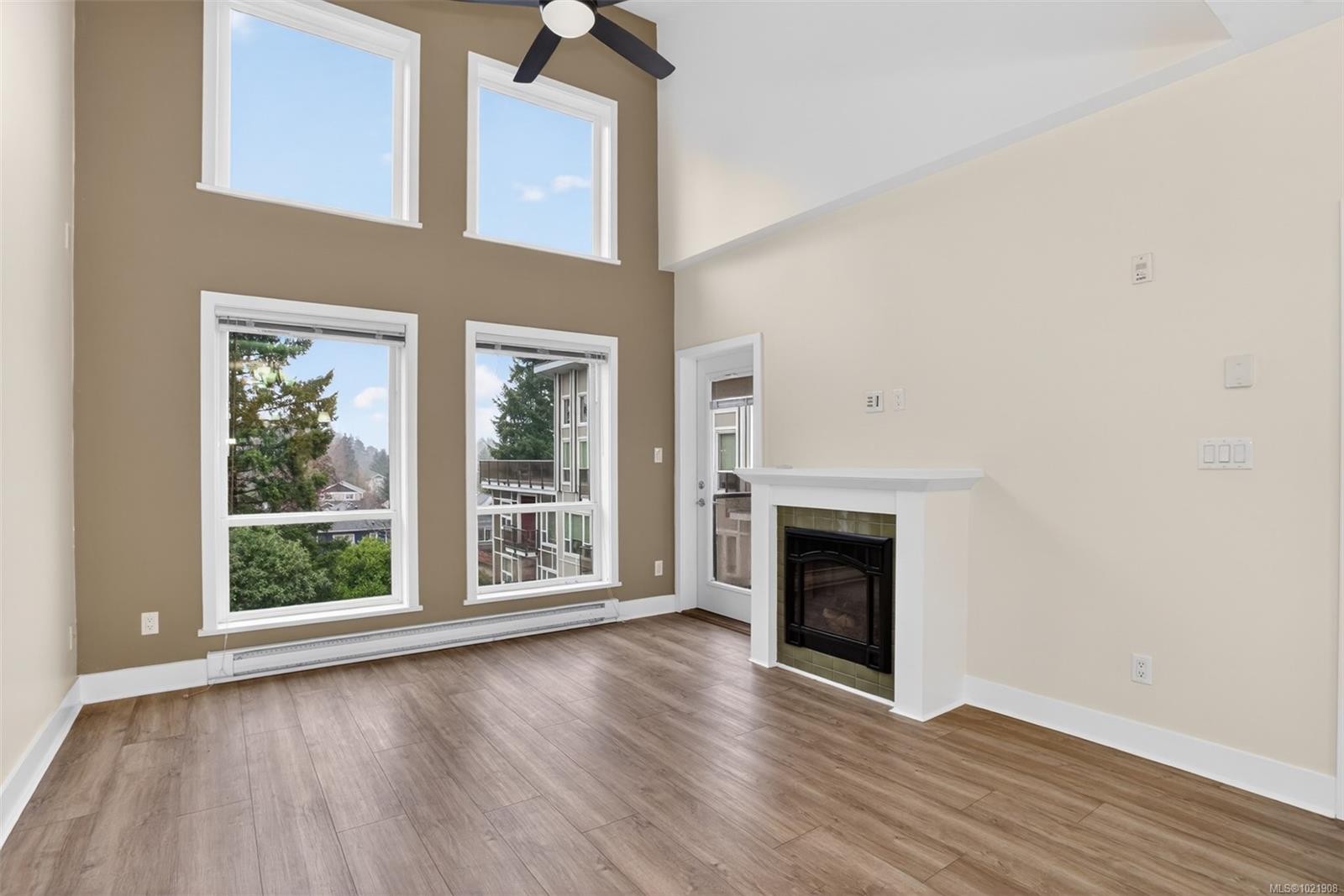 406-866 Brock Ave, Langford, BC - Indoor Photo Showing Living Room With Fireplace