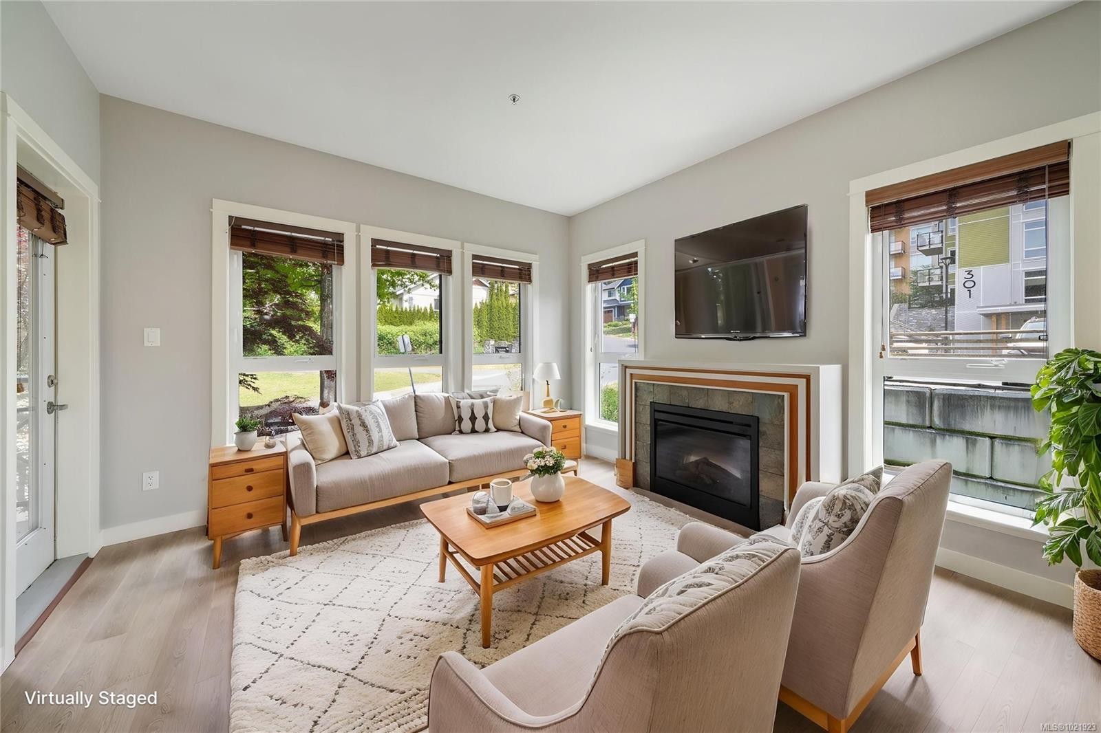 210-201 Nursery Hill Dr, View Royal, BC - Indoor Photo Showing Living Room With Fireplace