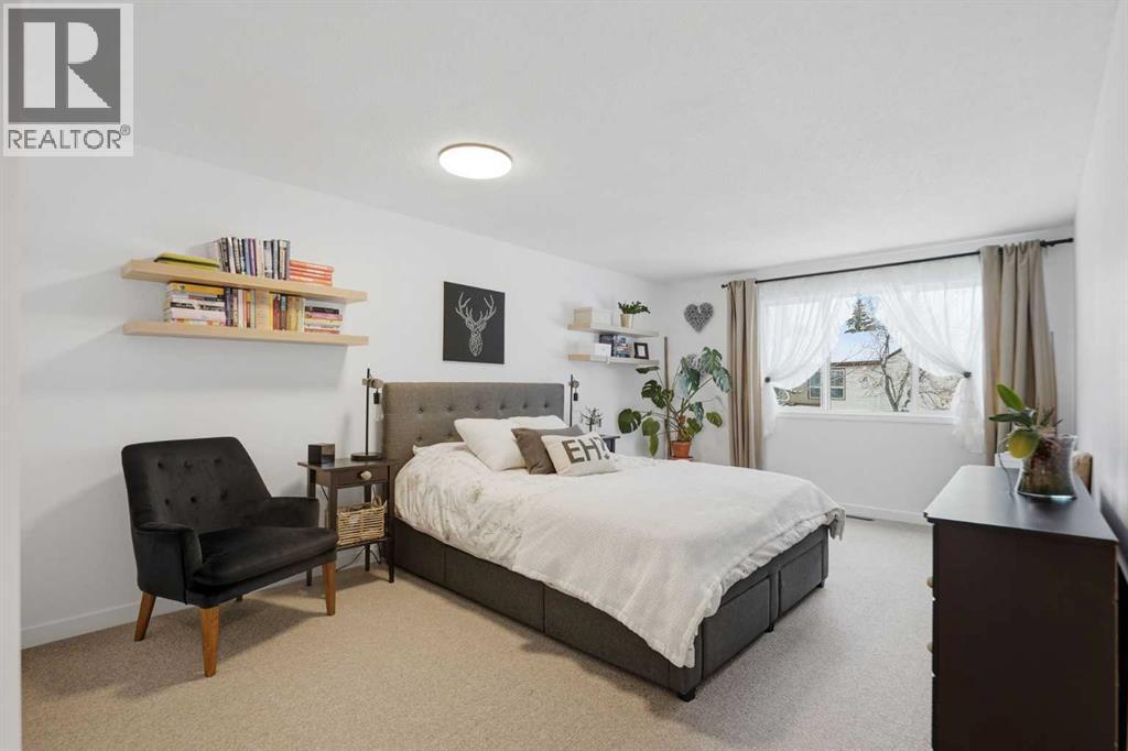 This Spacious Primary Retreat is Unique to Find in Townhouse - 86, 630 Sabrina Road Sw, Calgary, AB - Indoor Photo Showing Bedroom