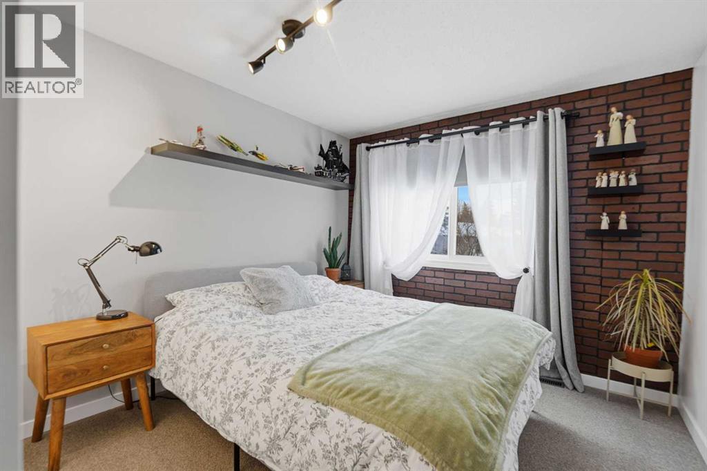 3rd Bedroom - 86, 630 Sabrina Road Sw, Calgary, AB - Indoor Photo Showing Bedroom