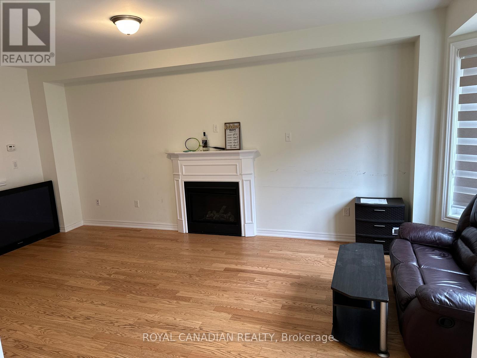 Upper - 3 Bushwood Trail, Brampton, ON - Indoor Photo Showing Living Room With Fireplace