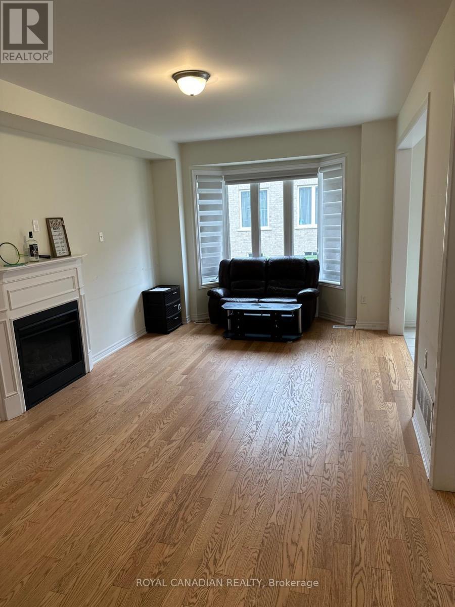 Upper - 3 Bushwood Trail, Brampton, ON - Indoor Photo Showing Living Room With Fireplace