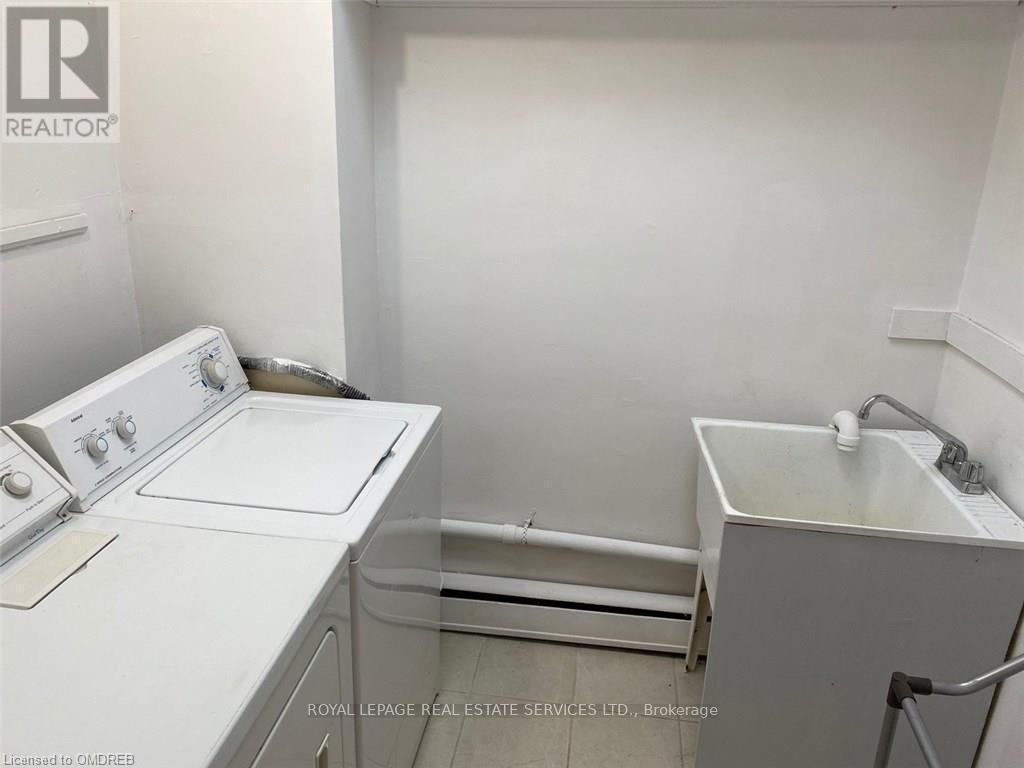 Laundry Room with washer & dryer - Second Floor - 385 Kerr Street, Oakville, ON - Indoor Photo Showing Laundry Room