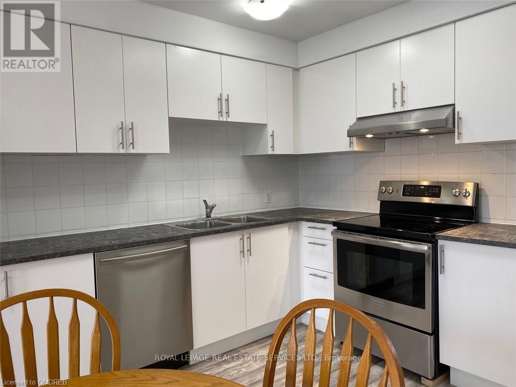Kitchen - Second Floor - 385 Kerr Street, Oakville, ON - Indoor Photo Showing Kitchen With Stainless Steel Kitchen With Double Sink