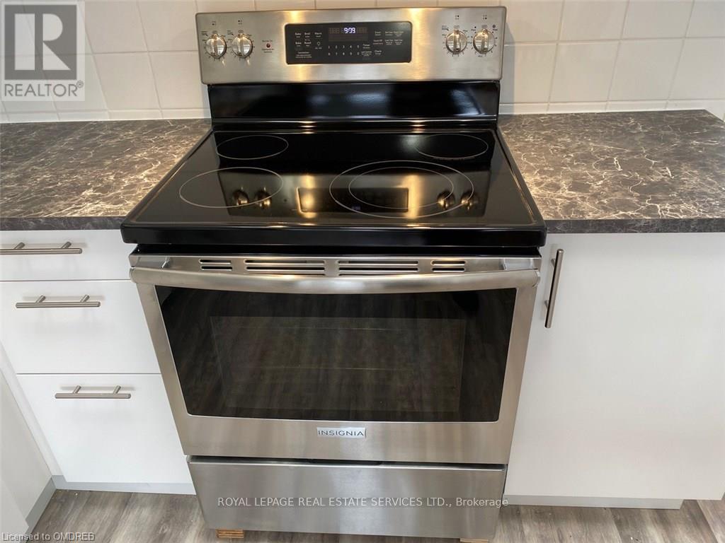 Stainless Stove - Second Floor - 385 Kerr Street, Oakville, ON - Indoor Photo Showing Kitchen