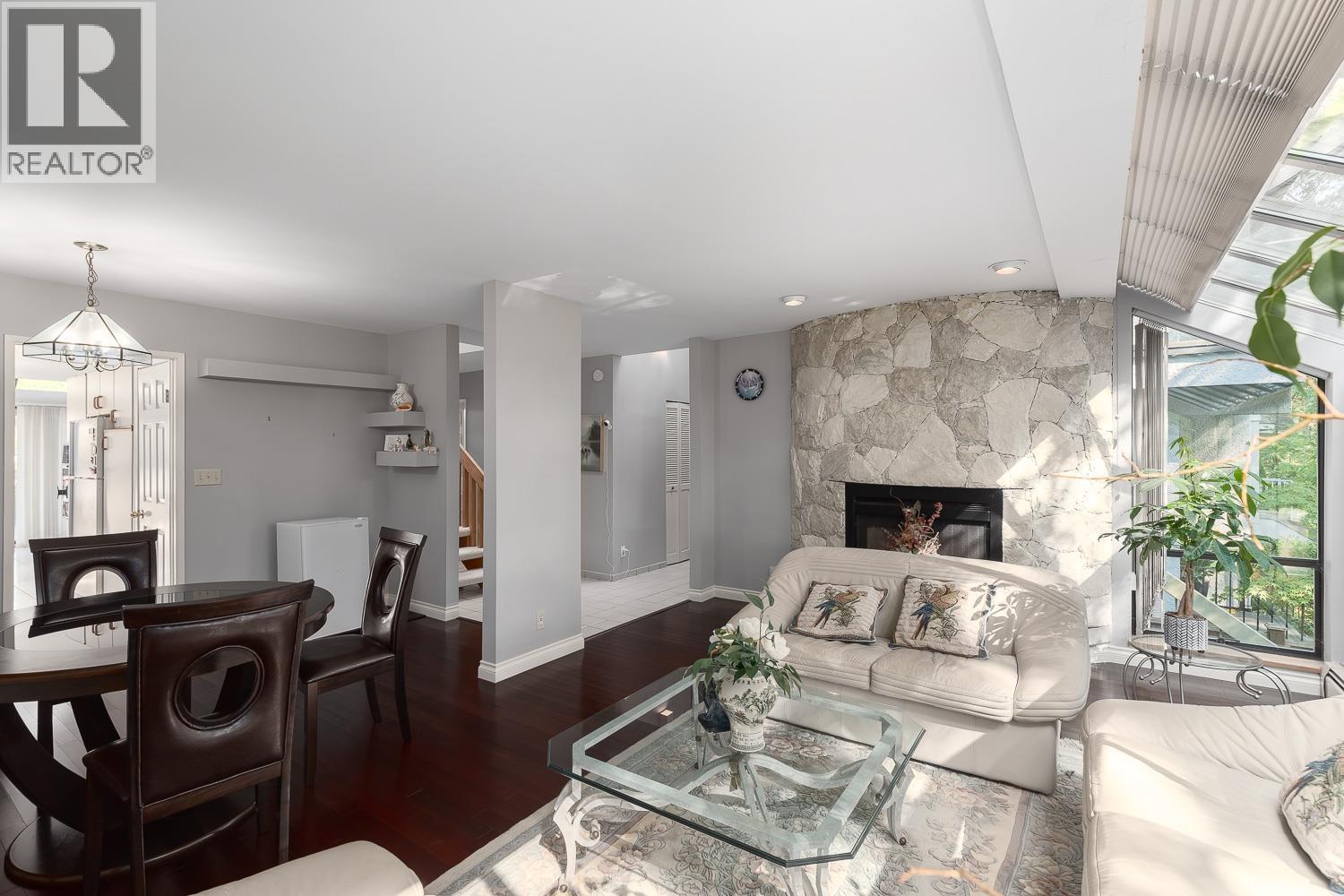 4027 W 32Nd Avenue, Vancouver, BC - Indoor Photo Showing Living Room With Fireplace