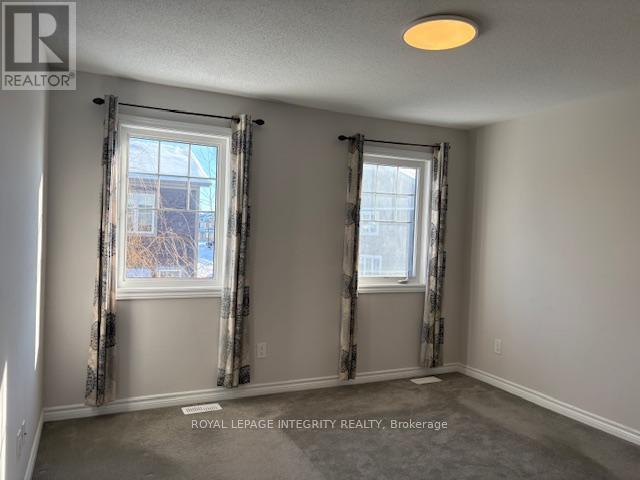 Primary Bedroom - 521 Honeylocust Avenue W, Ottawa, ON - Indoor Photo Showing Other Room