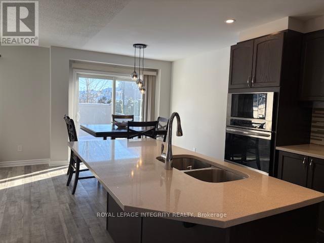 Quartz Island - 521 Honeylocust Avenue W, Ottawa, ON - Indoor Photo Showing Kitchen With Double Sink