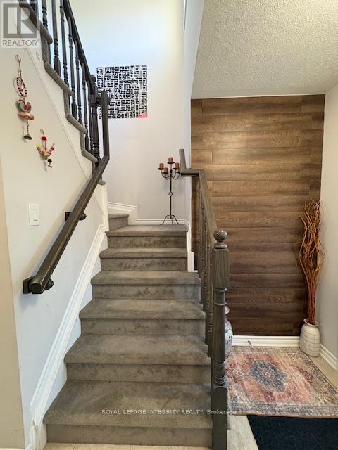 Staircase to Upper Level - 521 Honeylocust Avenue W, Ottawa, ON - Indoor Photo Showing Other Room
