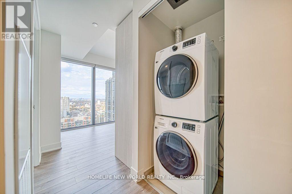 3002 - 8 Cumberland Street, Toronto, ON - Indoor Photo Showing Laundry Room