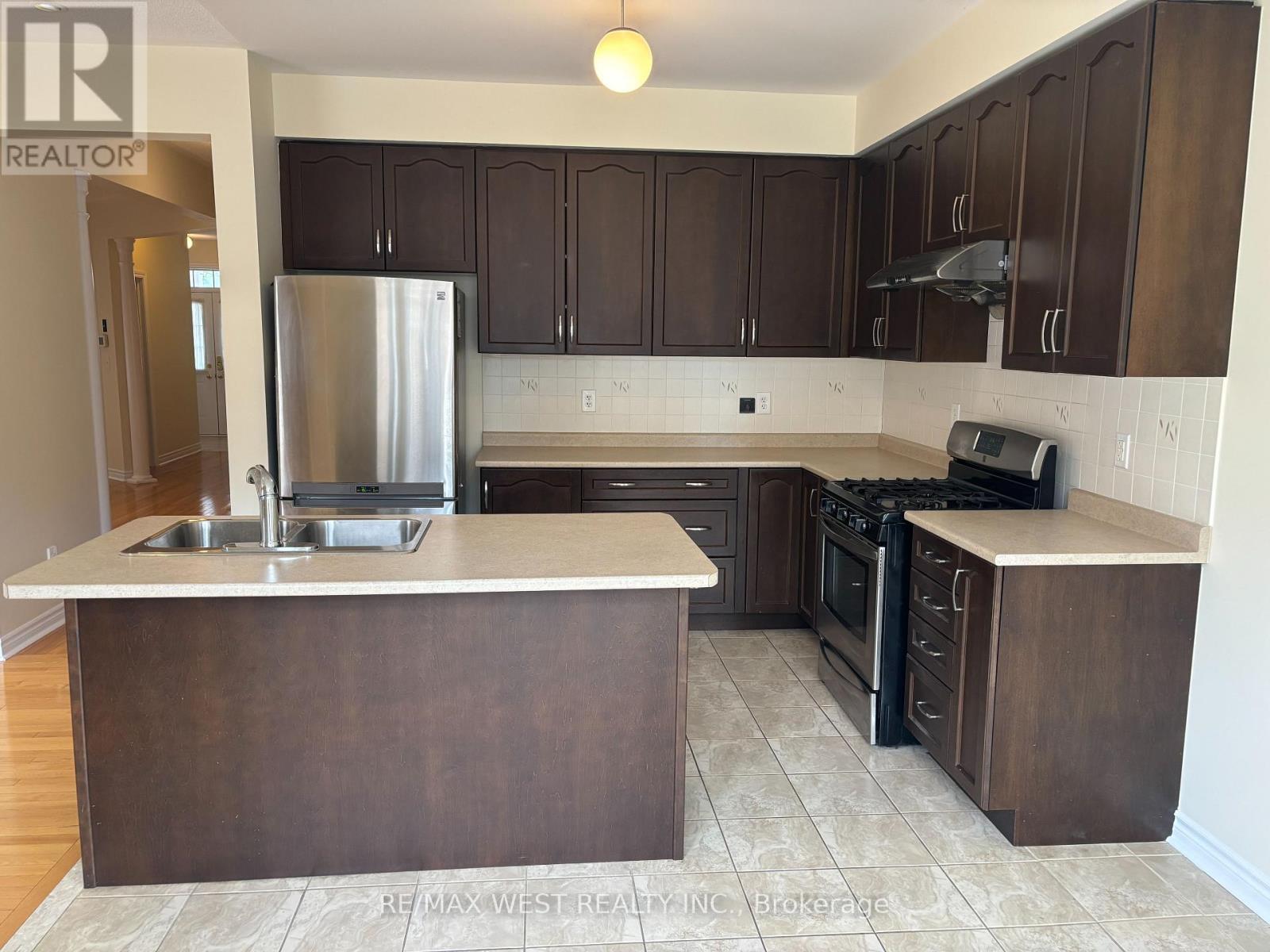 Upgraded Cabinets - 12 Haviland Circle, Brampton, ON - Indoor Photo Showing Kitchen With Double Sink