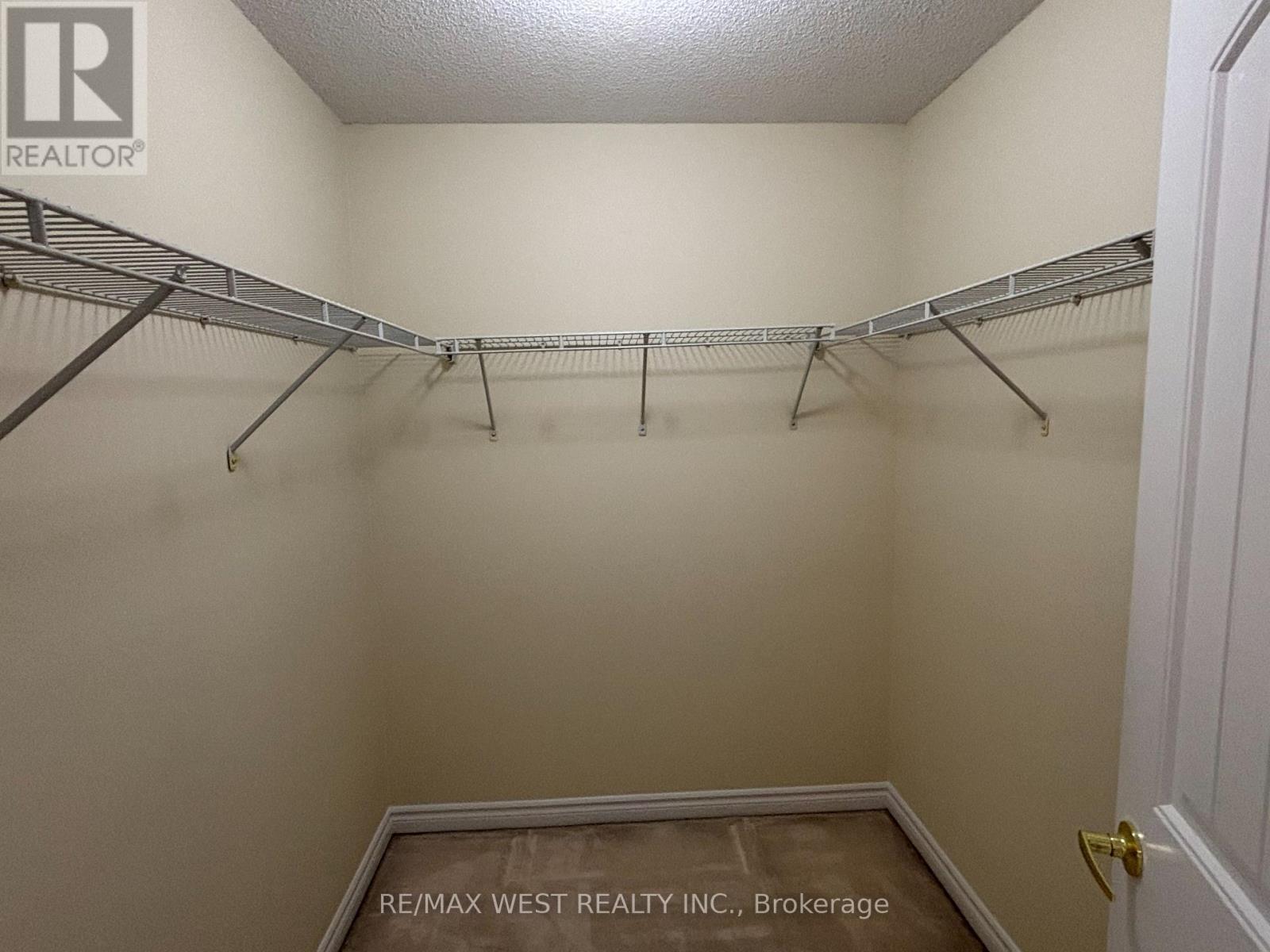 Walk in Closet in Primary Brm - 12 Haviland Circle, Brampton, ON - Indoor With Storage