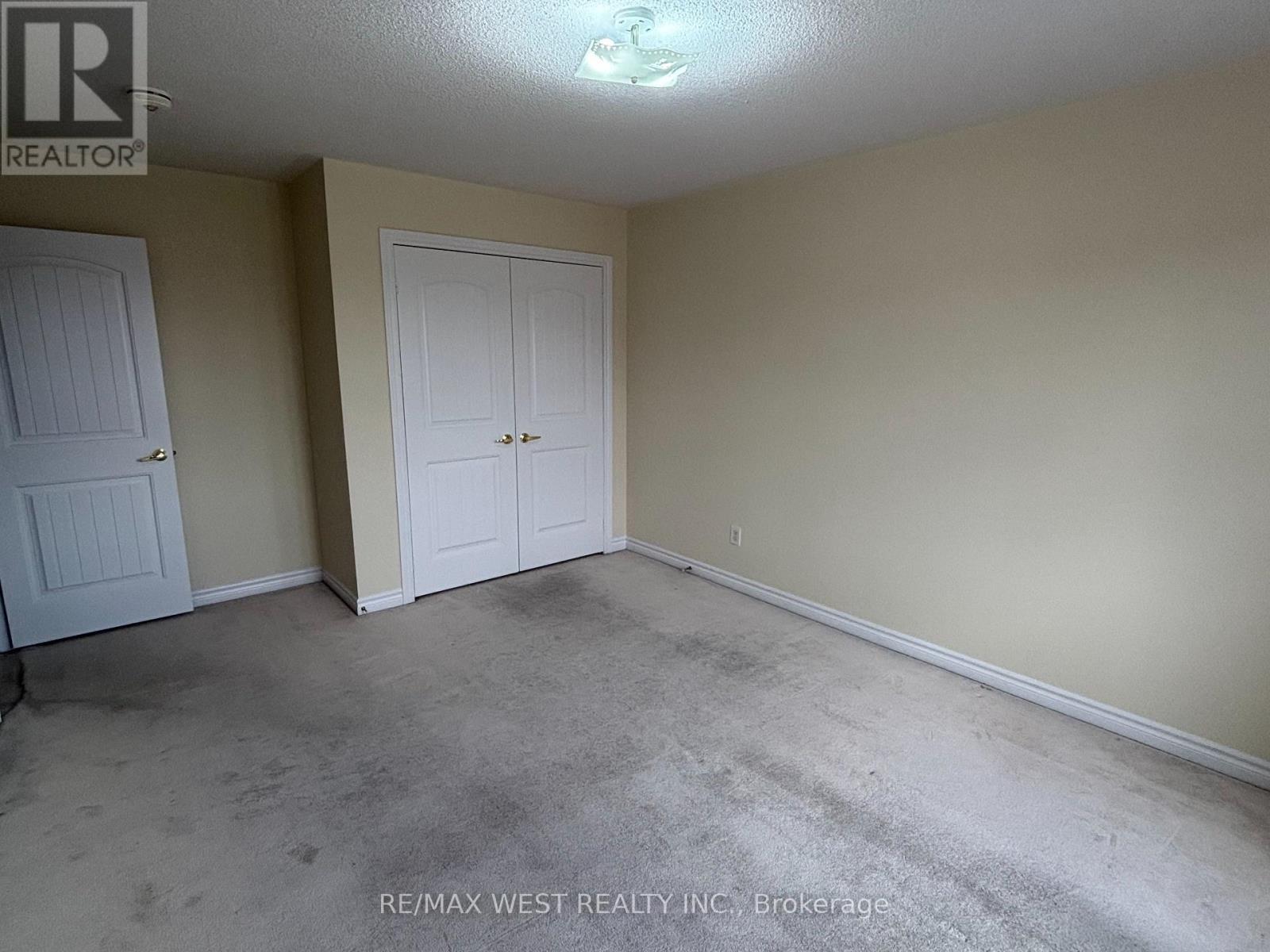 2nd Brm, Double Closet - 12 Haviland Circle, Brampton, ON - Indoor Photo Showing Other Room