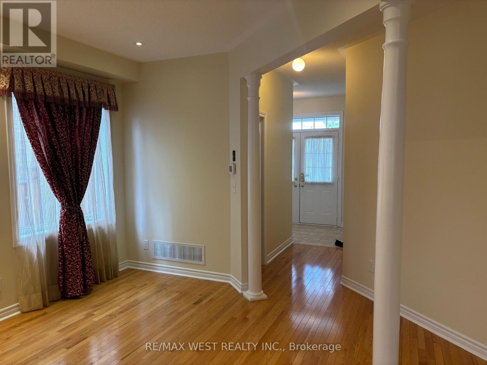 Large Windows draw in Natural Light - 12 Haviland Circle, Brampton, ON - Indoor Photo Showing Other Room