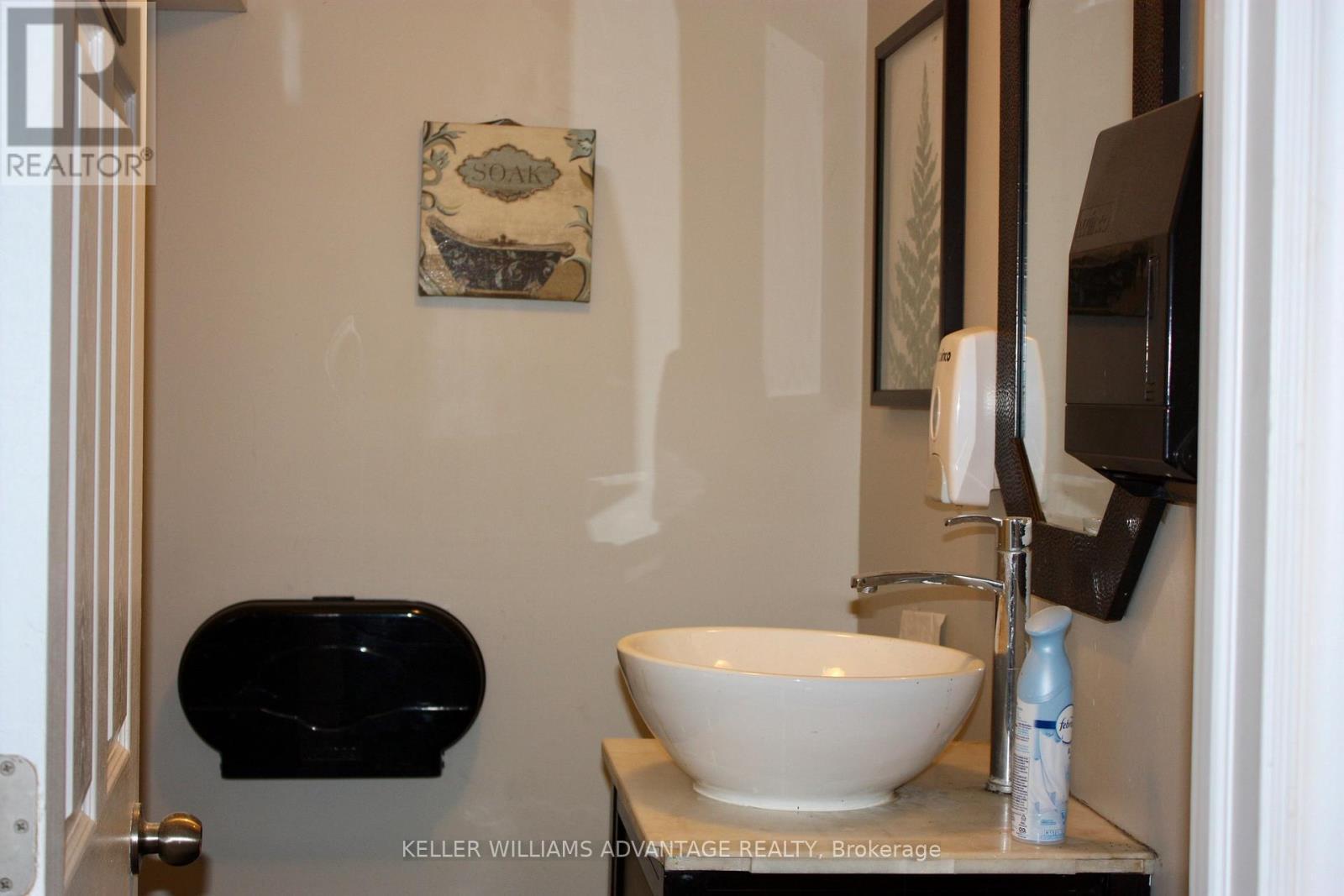 1 of 3 Washrooms - 672 Yonge Street, Toronto, ON