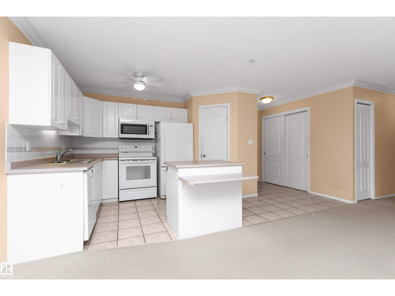 #304 20 St Joseph St, St. Albert, AB - Indoor Photo Showing Kitchen