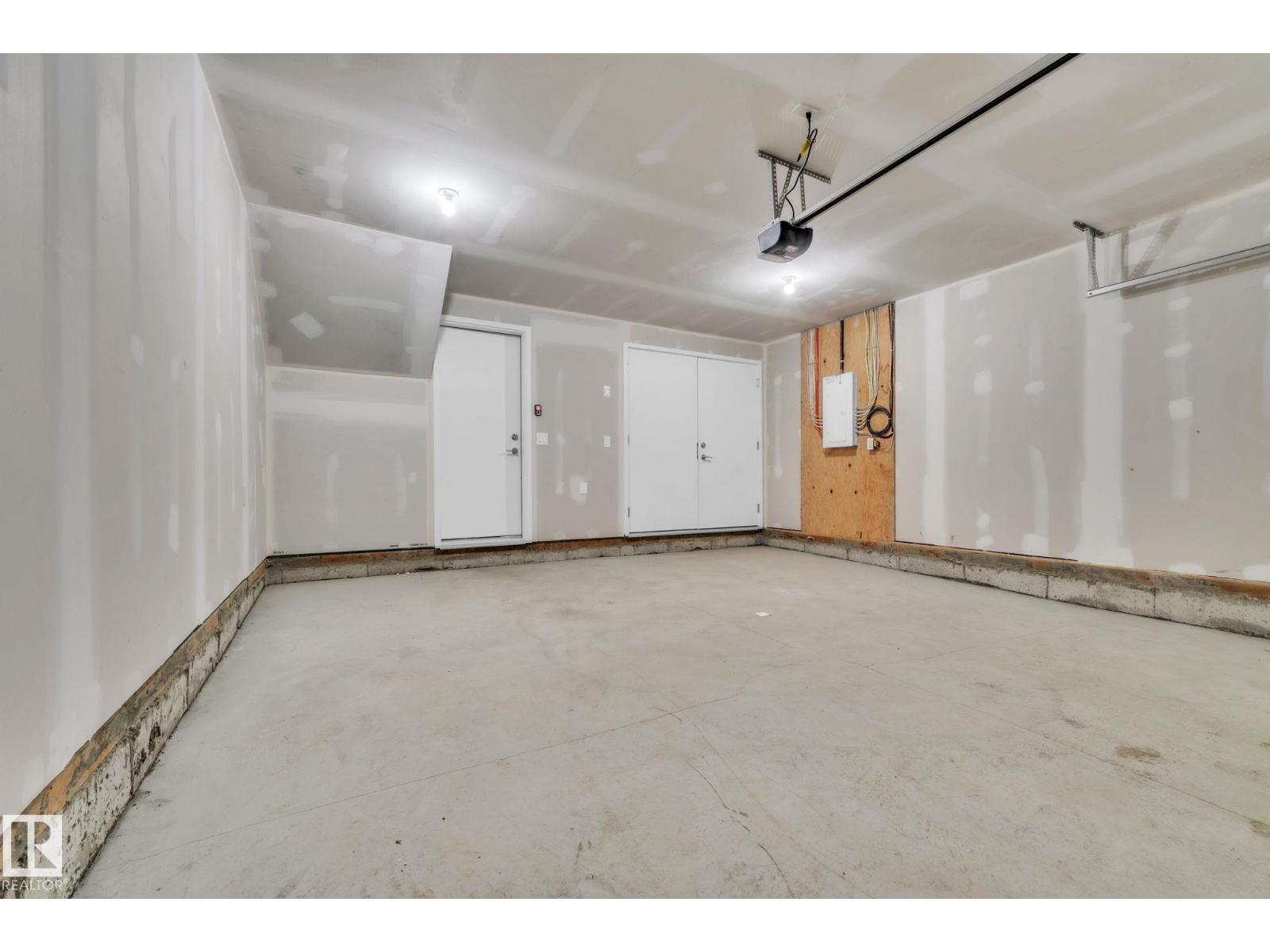 #15 6905 25 Av Sw, Edmonton, AB - Indoor Photo Showing Garage