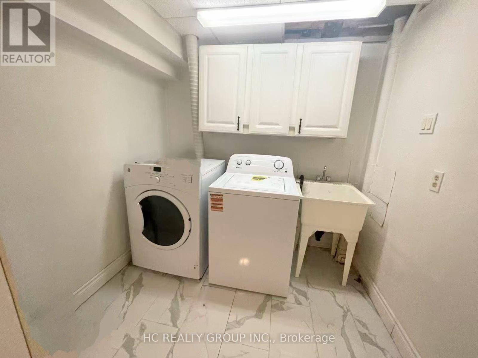 29 Basement - 3025 Cedarglen Gate, Mississauga, ON - Indoor Photo Showing Laundry Room