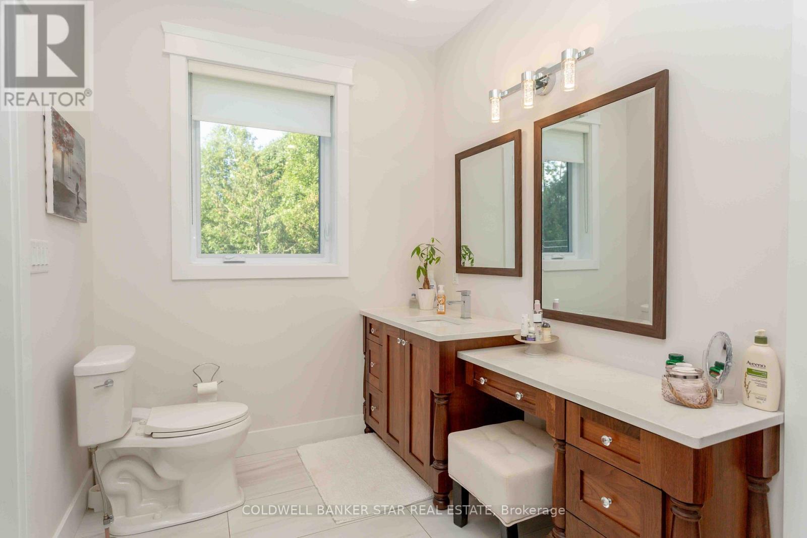 Primary ensuite with access to walk in closet. - 8037 Springwater Road, Central Elgin, ON
