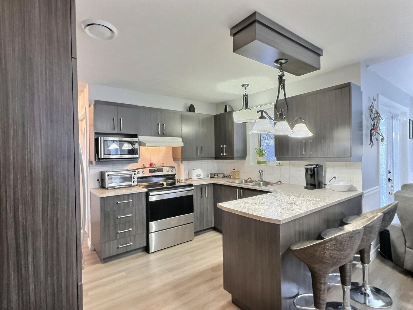 Kitchen - 22 Rue St-Isidore O., Laverlochère-Angliers, QC - Indoor Photo Showing Kitchen With Double Sink