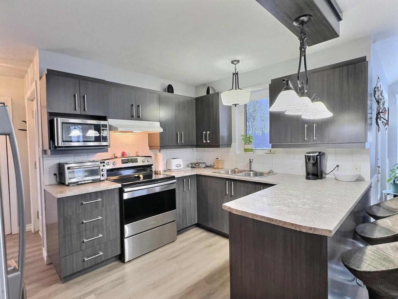 Kitchen - 22 Rue St-Isidore O., Laverlochère-Angliers, QC - Indoor Photo Showing Kitchen With Double Sink