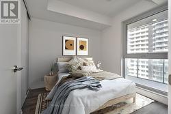 Virtually Staged Bedroom with Laminate Flooring -