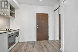 Wide-Plank Laminate Flooring Throughout -