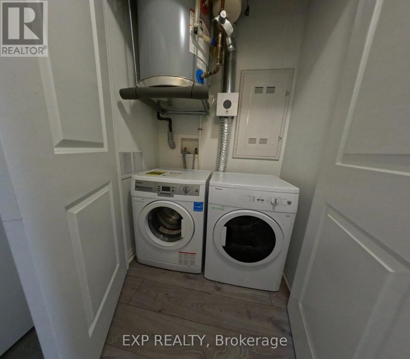 319 - 1900 Simcoe Street E, Oshawa, ON - Indoor Photo Showing Laundry Room