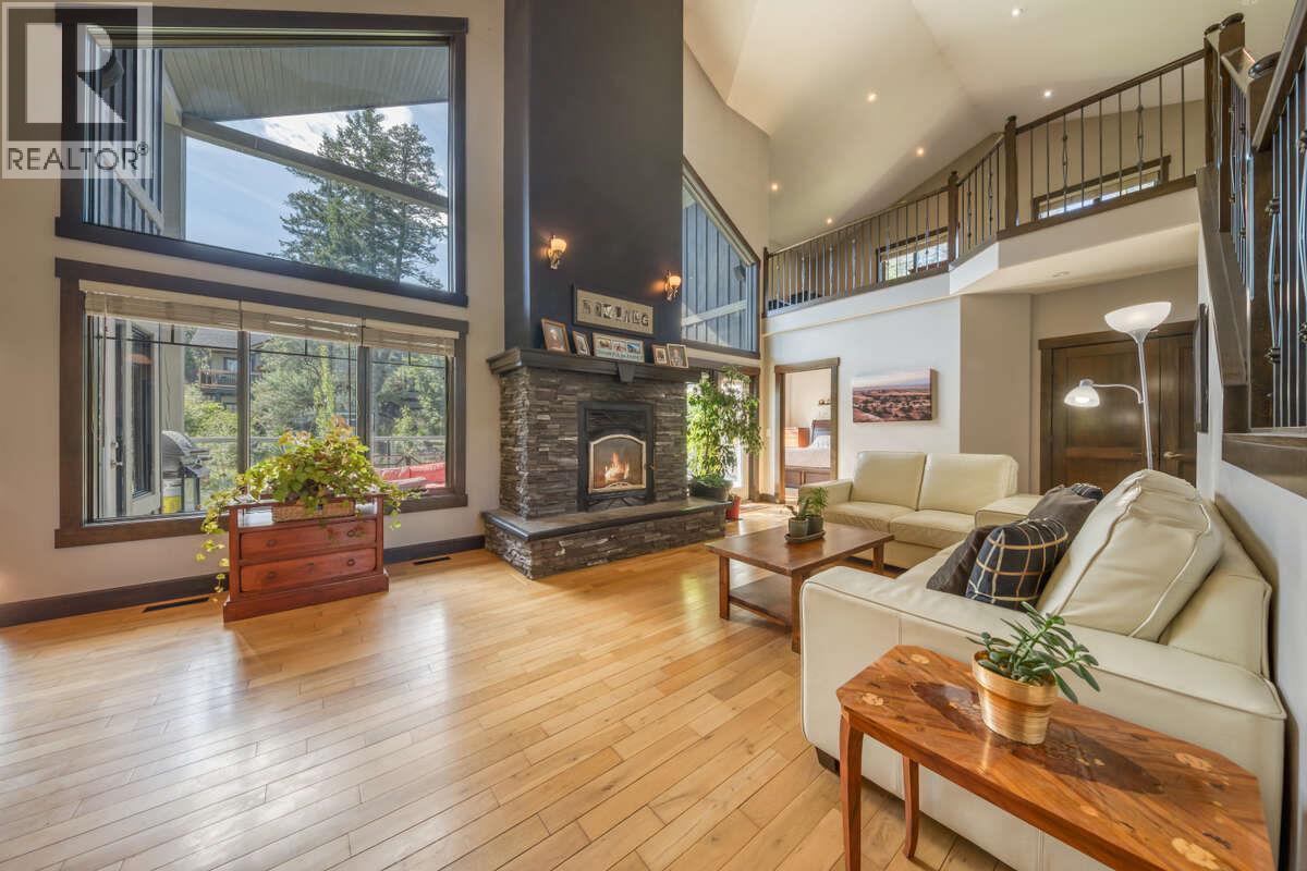 2576 Sandstone Green, Invermere, BC - Indoor Photo Showing Living Room With Fireplace