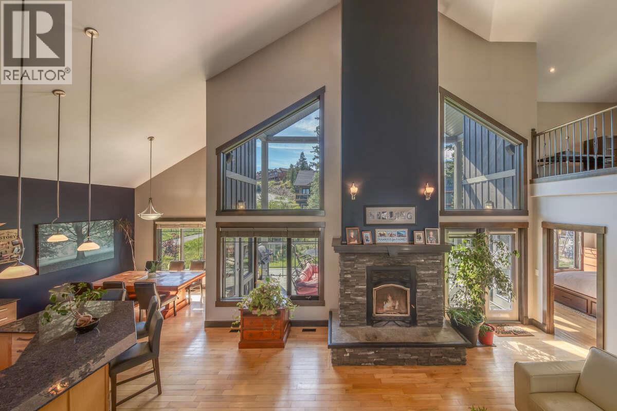 2576 Sandstone Green, Invermere, BC - Indoor With Fireplace