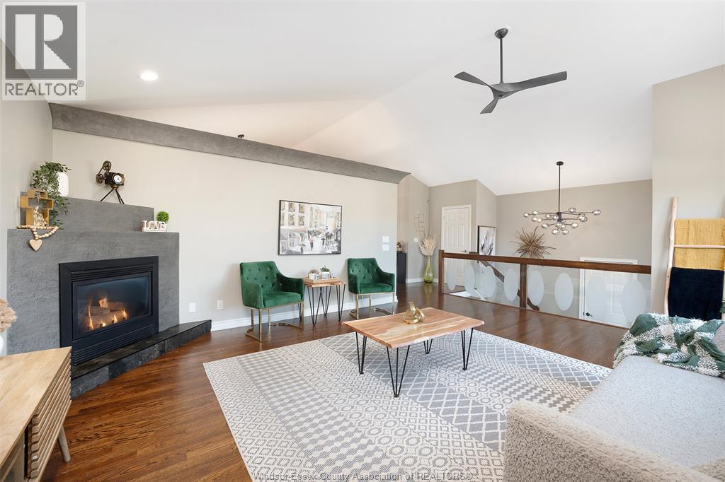 123 Pheasant Run, Lakeshore, ON - Indoor Photo Showing Living Room With Fireplace
