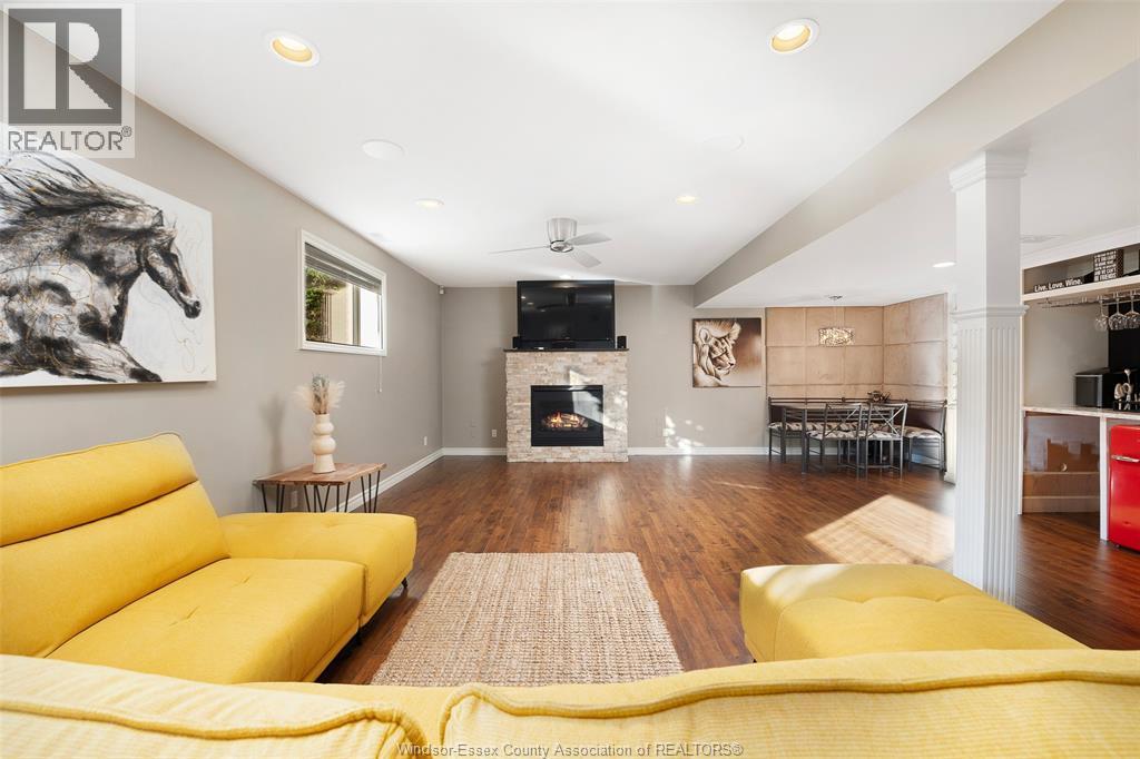 123 Pheasant Run, Lakeshore, ON - Indoor Photo Showing Living Room With Fireplace
