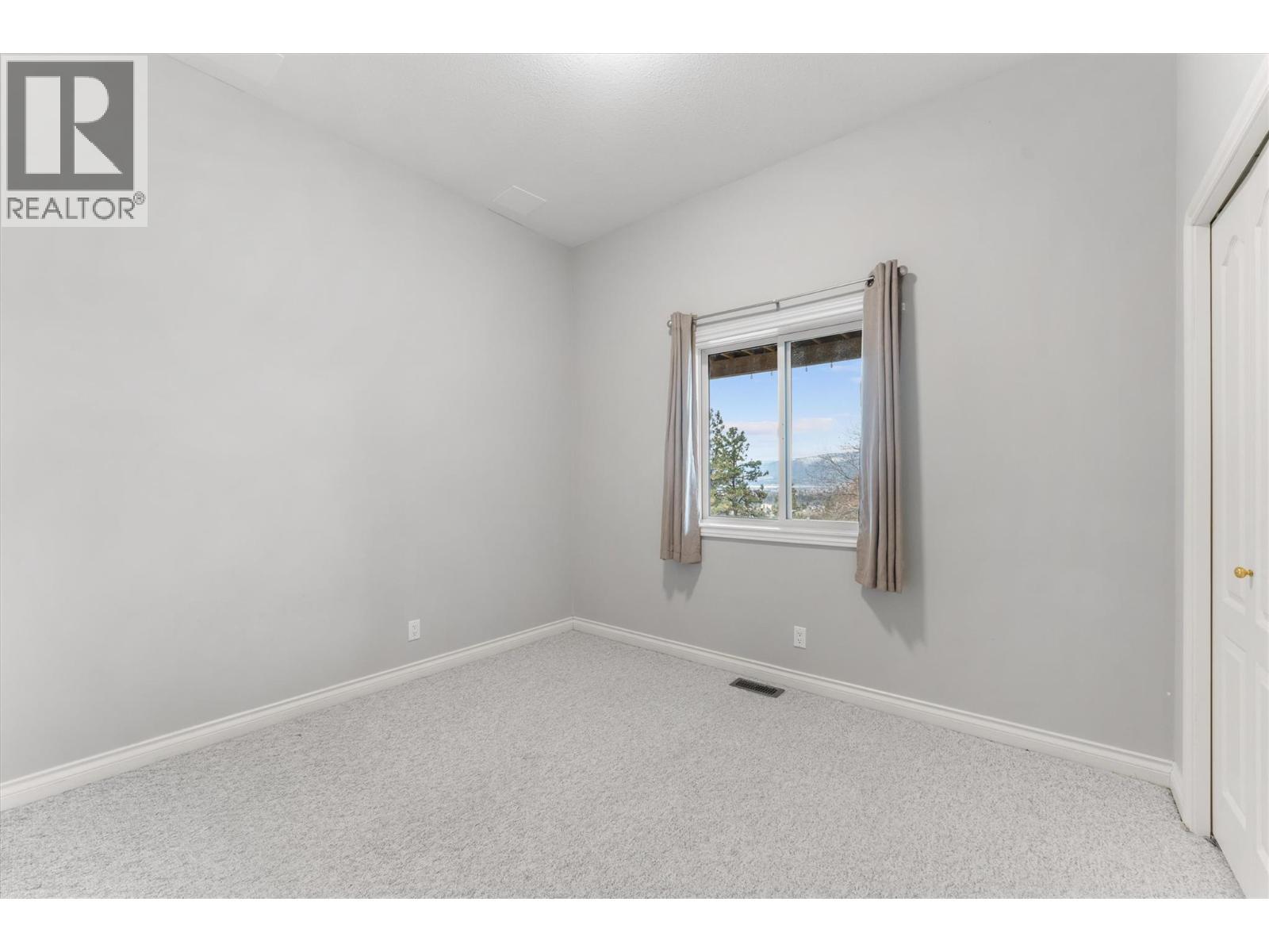 1180 Ray Road, Kelowna, BC - Indoor Photo Showing Other Room