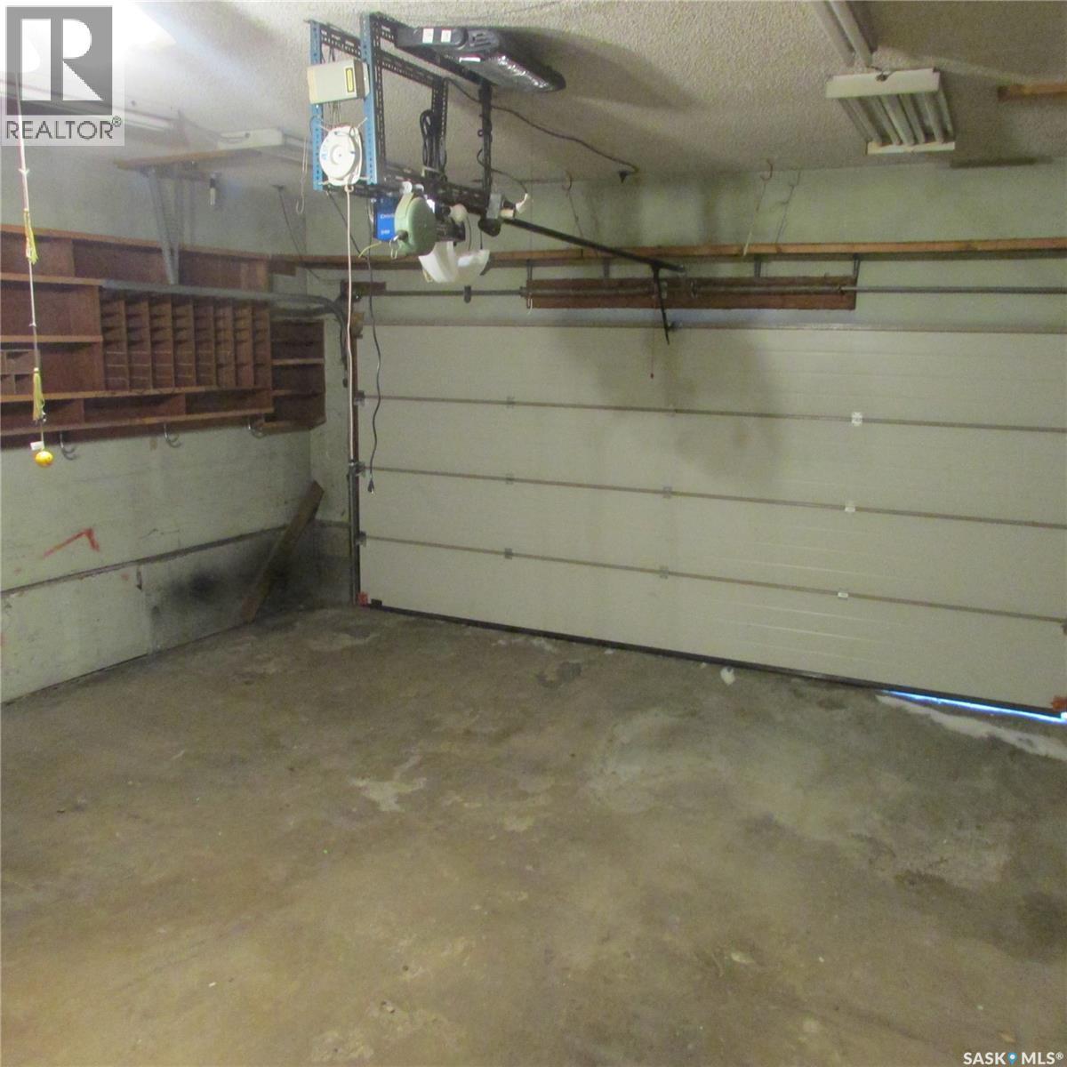 11 Watts Bay, Regina, SK - Indoor Photo Showing Garage