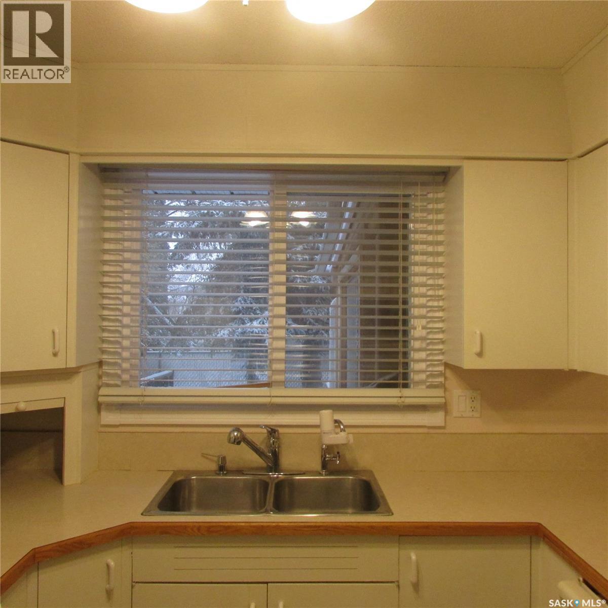 11 Watts Bay, Regina, SK - Indoor Photo Showing Kitchen With Double Sink
