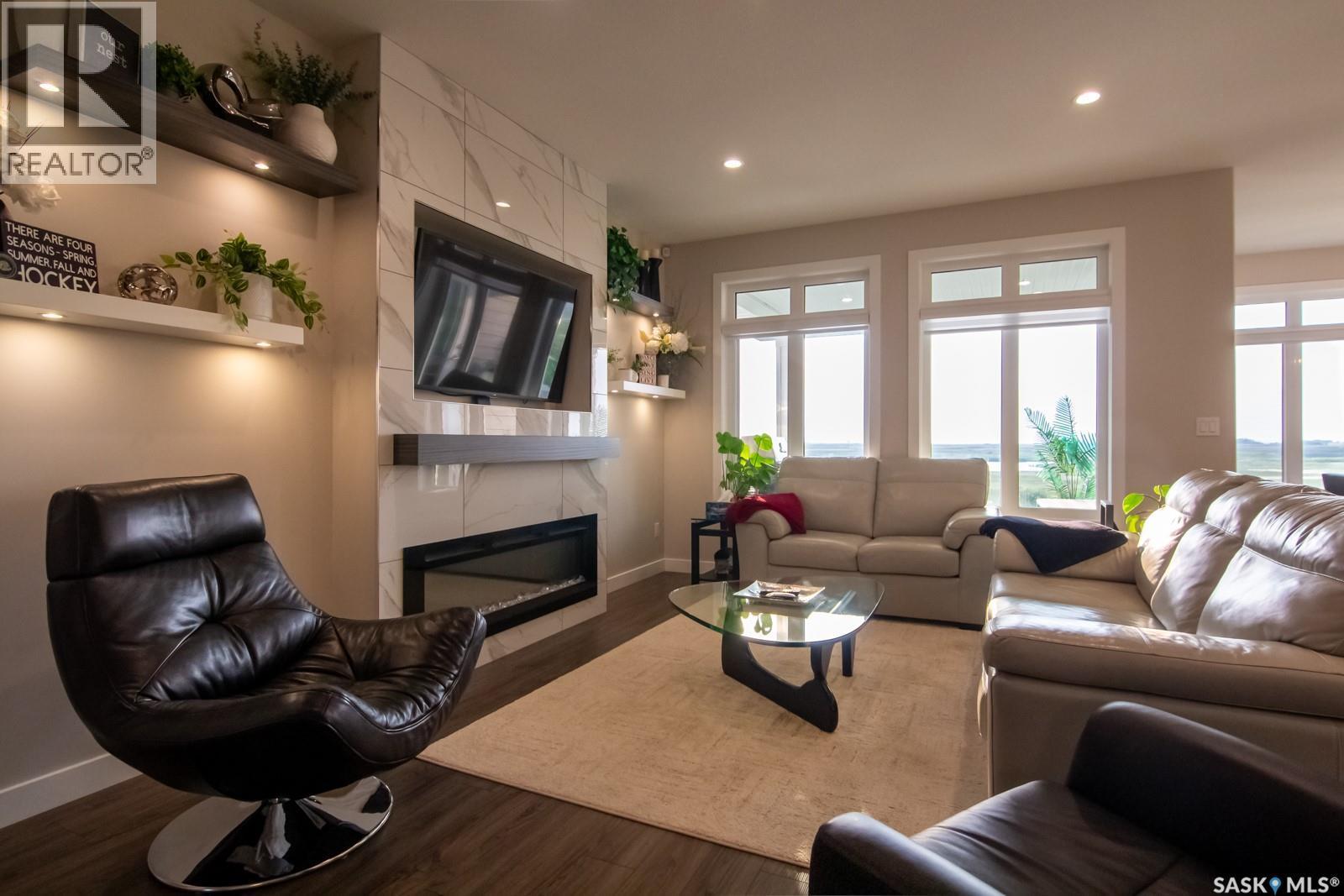 635 Kenaschuk Crescent, Saskatoon, SK - Indoor Photo Showing Living Room With Fireplace