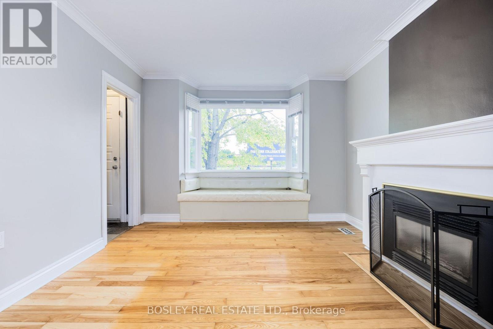 651 Cosburn Avenue, Toronto, ON - Indoor Photo Showing Other Room With Fireplace