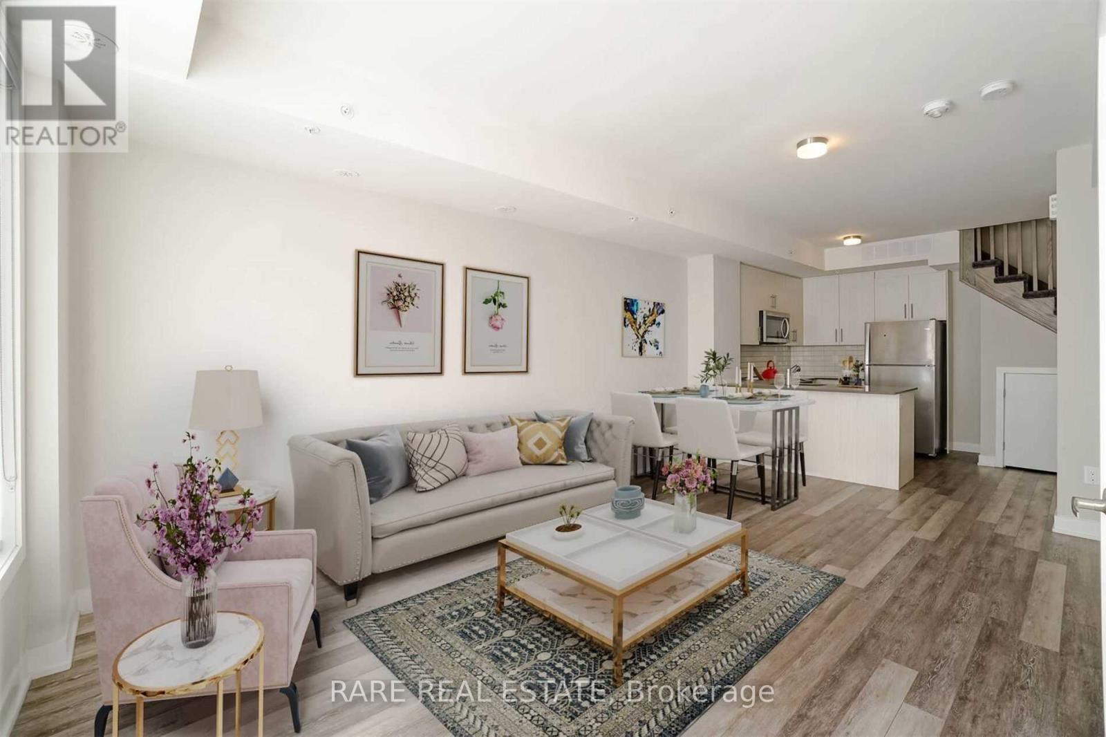 8 - 3483 Widdicombe Way, Mississauga, ON - Indoor Photo Showing Living Room