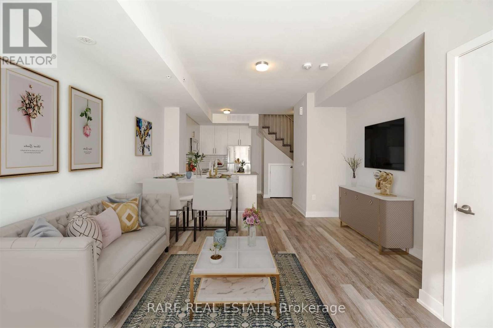 8 - 3483 Widdicombe Way, Mississauga, ON - Indoor Photo Showing Living Room