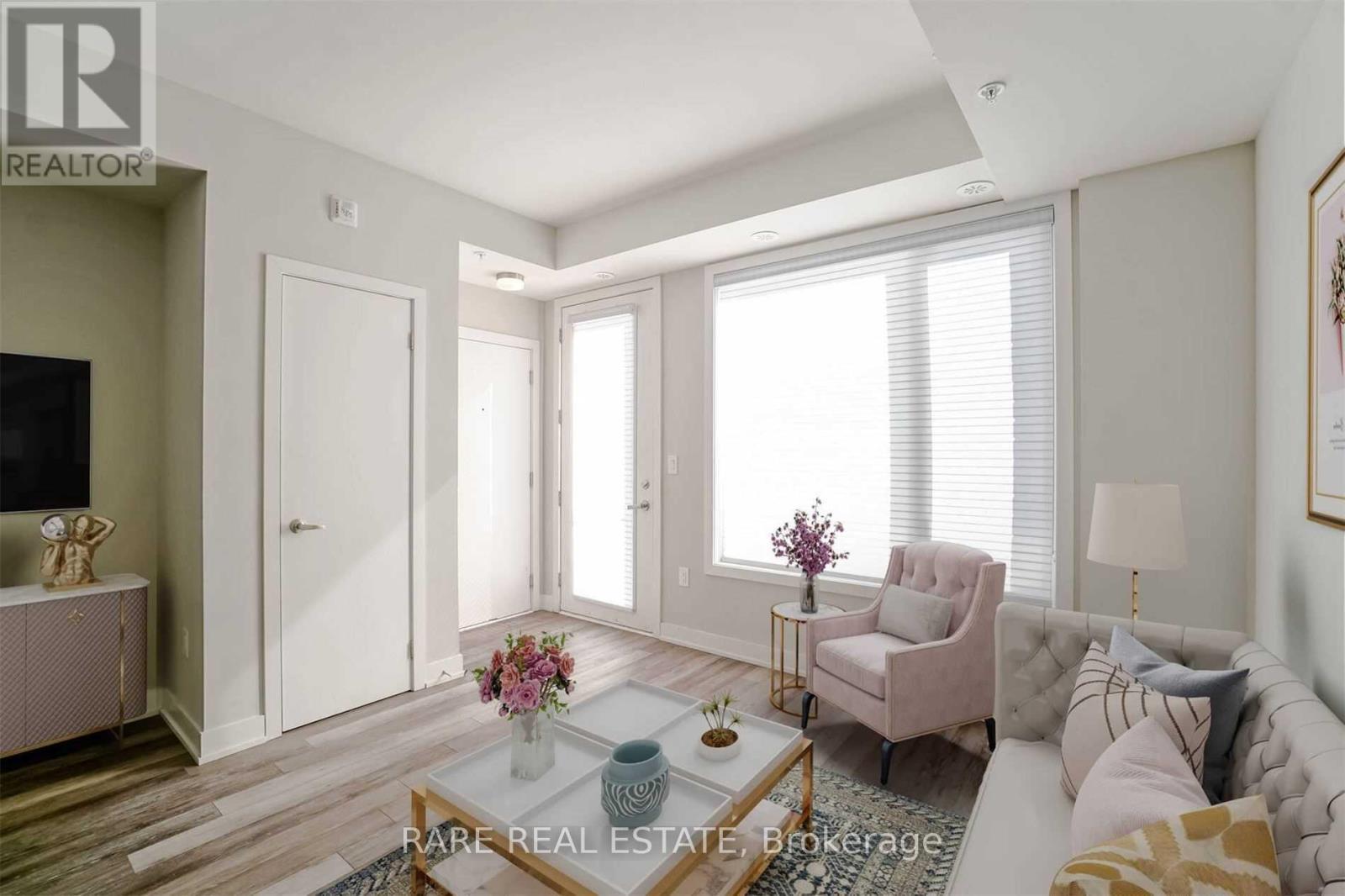 8 - 3483 Widdicombe Way, Mississauga, ON - Indoor Photo Showing Living Room