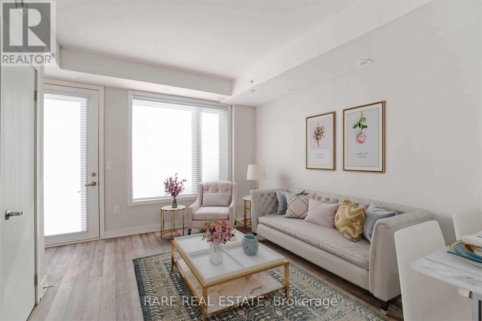 8 - 3483 Widdicombe Way, Mississauga, ON - Indoor Photo Showing Living Room