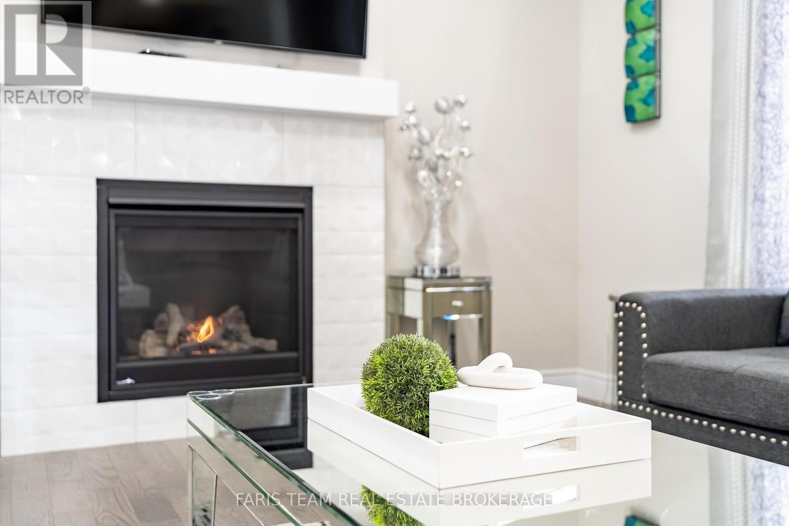 13 Tindall Crescent, East Luther Grand Valley, ON - Indoor Photo Showing Living Room With Fireplace