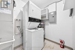 Utility/laundry room with additional storage space -