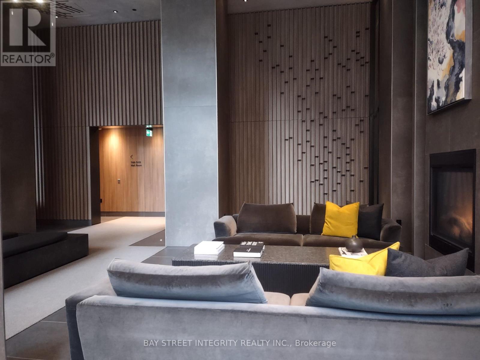 2009 - 55 Charles Street E, Toronto, ON - Indoor Photo Showing Living Room With Fireplace