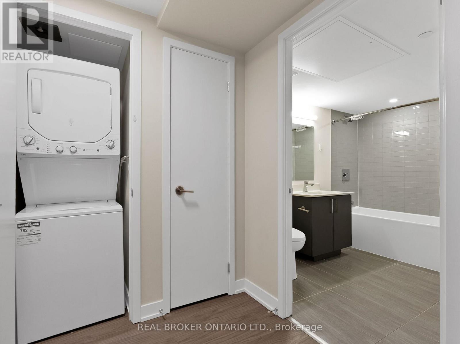 405 - 38 Monte Kwinter Court, Toronto, ON - Indoor Photo Showing Laundry Room