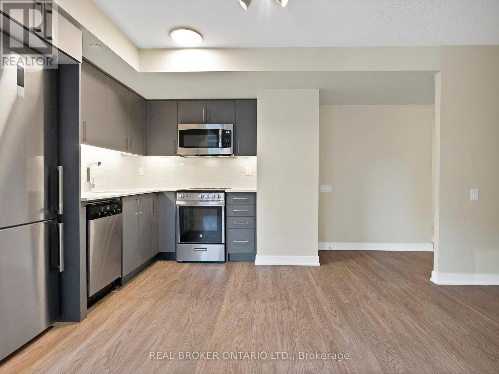 405 - 38 Monte Kwinter Court, Toronto, ON - Indoor Photo Showing Kitchen With Stainless Steel Kitchen